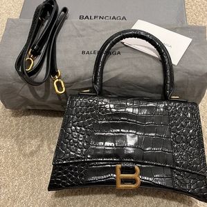 Balenciaga top-handle bag in crocodile-embossed calfskin leather.